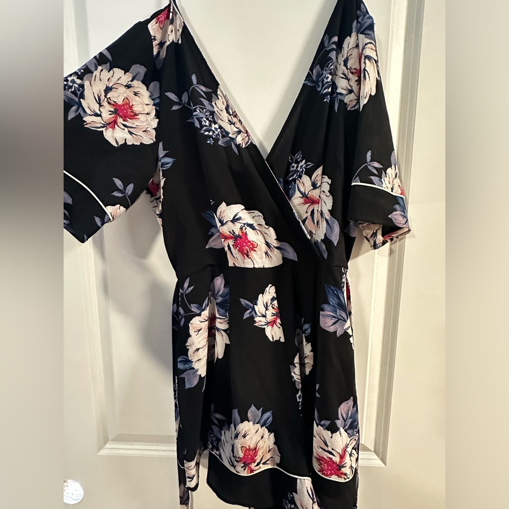 Trixxi: Black romper with floral print